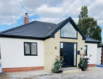 Rough cast (pebble dash) finish rendering in South Yorkshire.